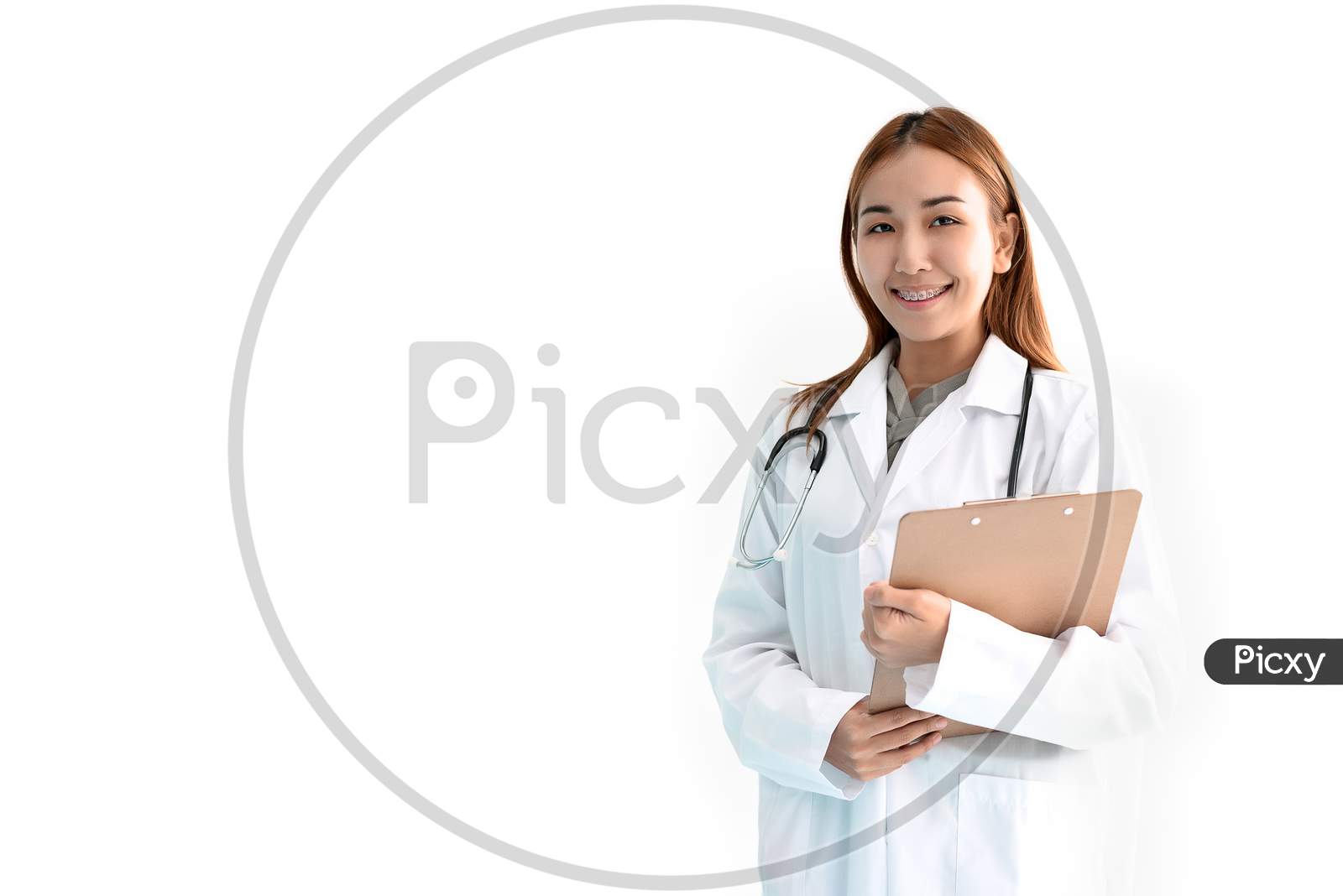 Women Doctor Is Holding The Report File With Stethoscope On White Isolated Background. Medical And Healthcare Concept. Hospital And People Theme