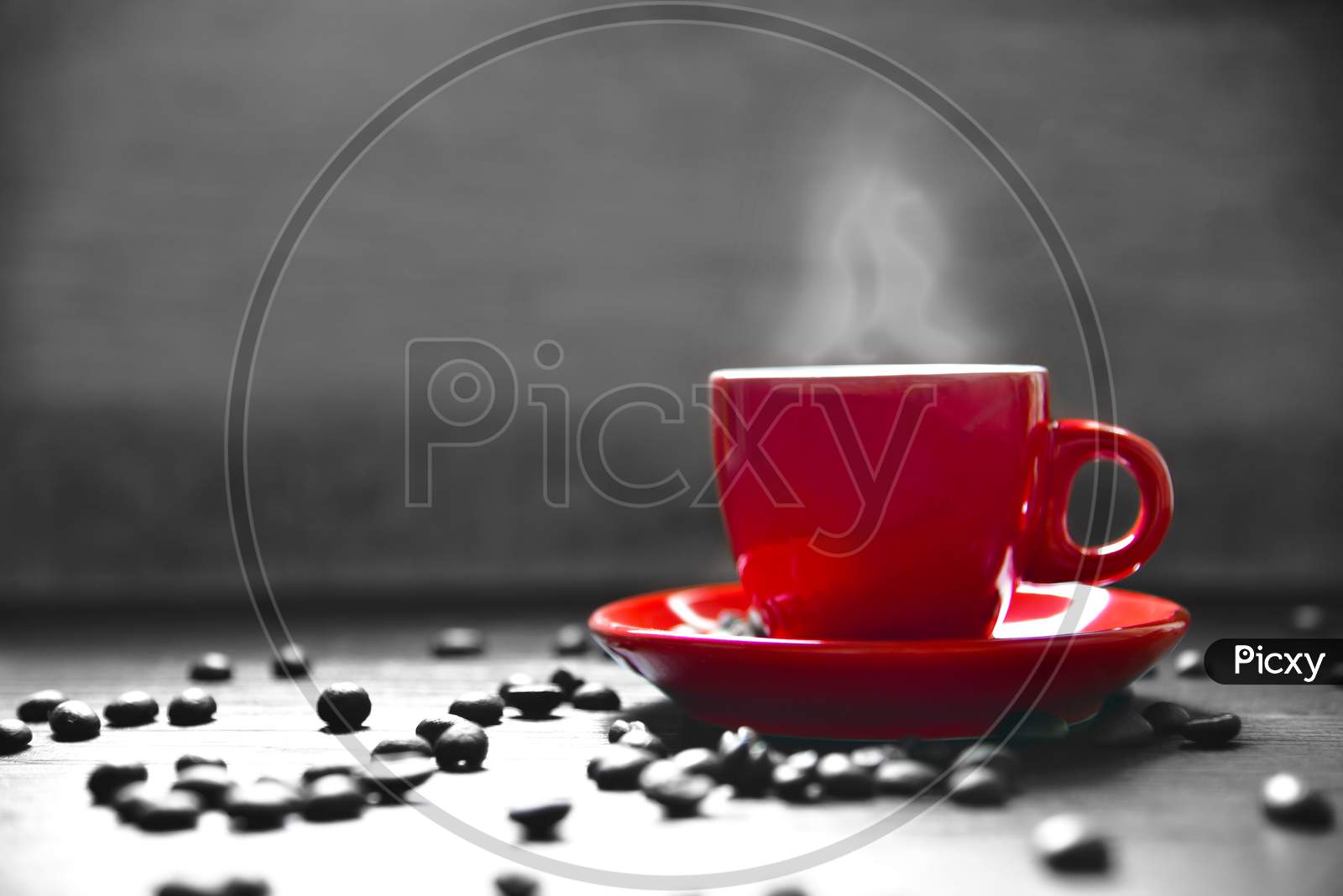 Red Cup Coffee With Smoke And Coffee Bean On Wood Table, Drinking Concept, Selective Red Color