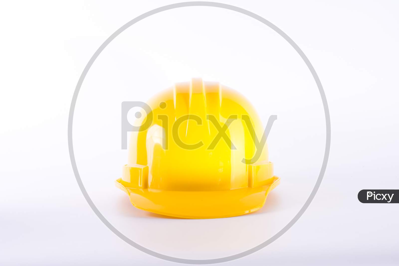 Yellow Safety Helmet On White Background. Hard Hat Isolated On White. Safety Equipment Concept. Worker And Industrial Theme.