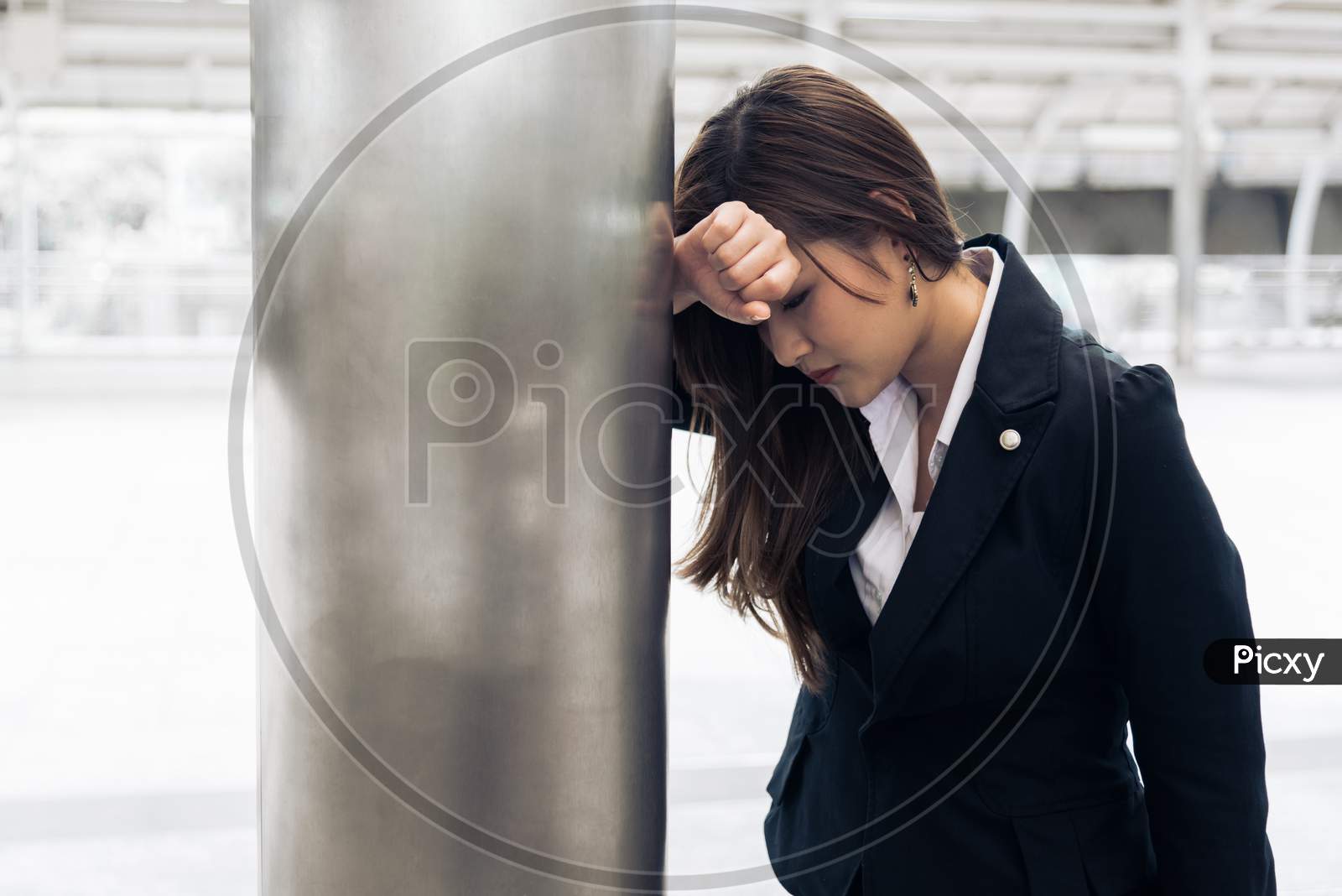Asian Business Woman Tired From Overworked And Being Heart Attack When Going Home After Overtime Working. Lack Of Sleeping And Healthcare Concept. Health And Stress Of Business Salary Employee