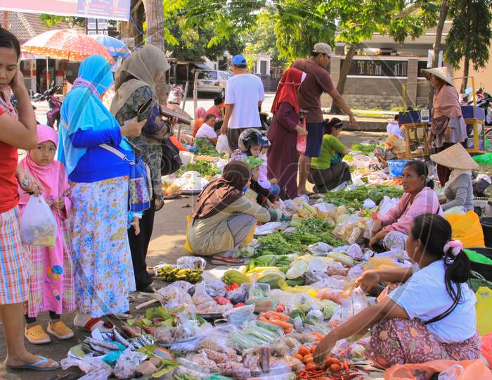 People In Wet Market Selling Goods In Indonesia