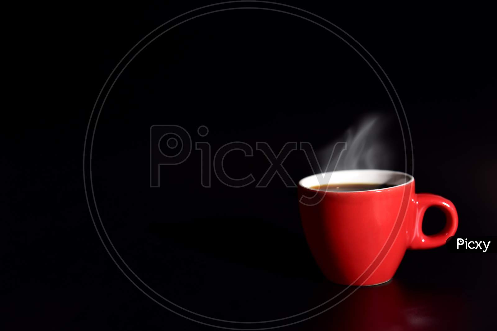 Red Cup Coffee On Black Background For Love Concept, Relax Concept, Drinking Concept For Advertisement, Selective Focus On Cup Edge