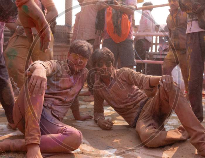 Indian people celebrating Colorful Holi festival at Barsana