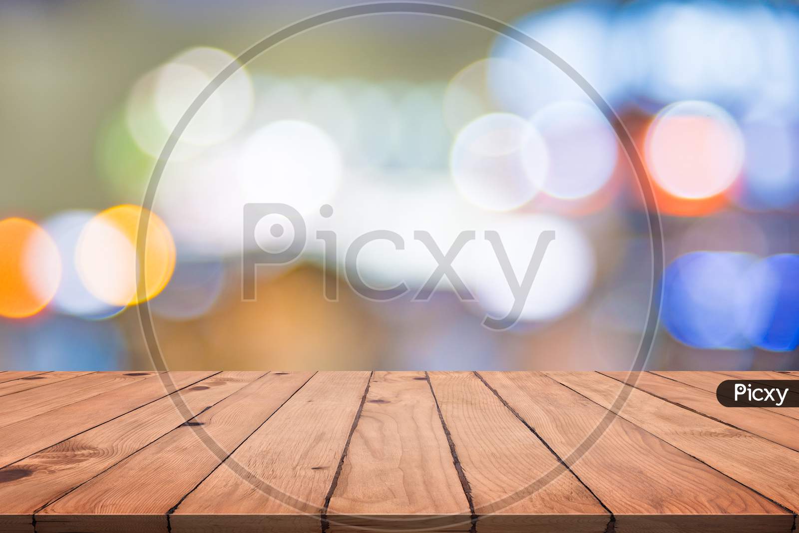 Empty Wood Table With Colorful Abstract Bokeh. Wallpaper And Texture Concept. City Light And Product Stage Showing Theme. Presentation Template