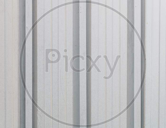 Silver Metal Sheet Roof Background Textured Wallpaper. Industry And Manufacturing Concept.