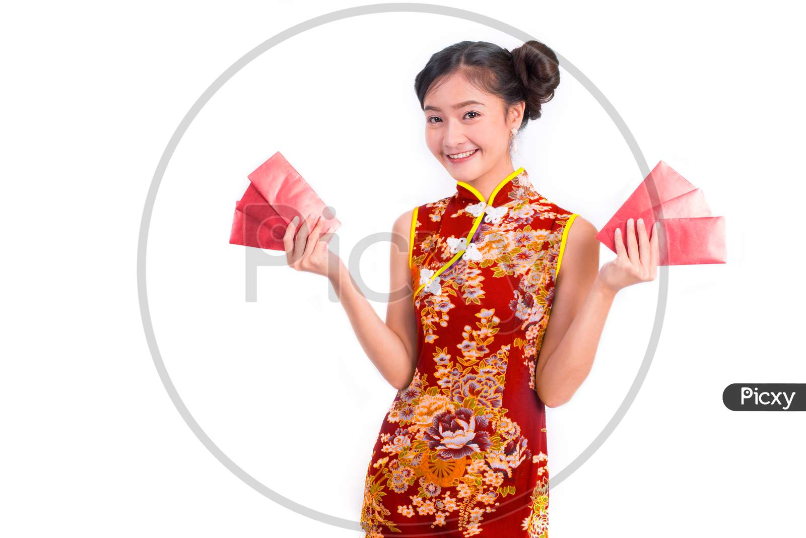 Young Asian Beauty Woman Wearing Cheongsam And Carry Red Packet Of Money In Chinese New Year Festival Event On Isolated White Background. Holiday And Lifestyle Concept. Qipao Dress Wearing