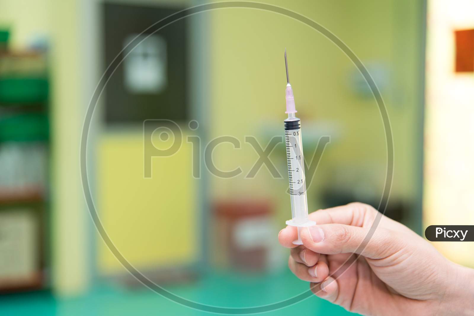 Syringe And Ampule, Medical Injection In Hand. Hospital And Medical Concept