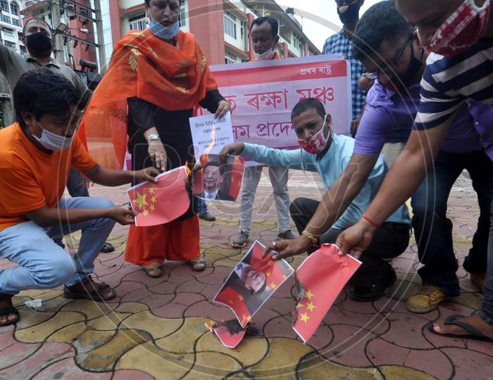 Activists Of Bharat  Raksha Manch Burn A Photo  Of Chinese President Xi Jinping During A Protest Against China Over Galwan Valley Incident, In Guwahati On June 18, 2020.