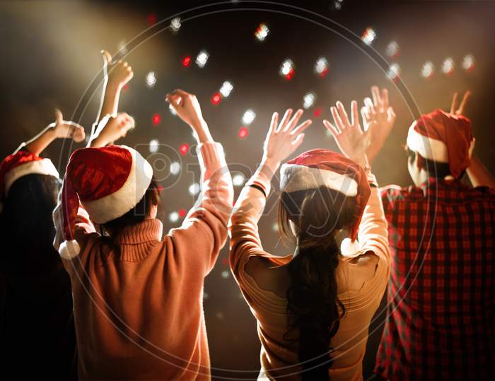 Christmas And New Year Party Celebration. People And Holiday Concept. Dancing And Celebrate Theme
