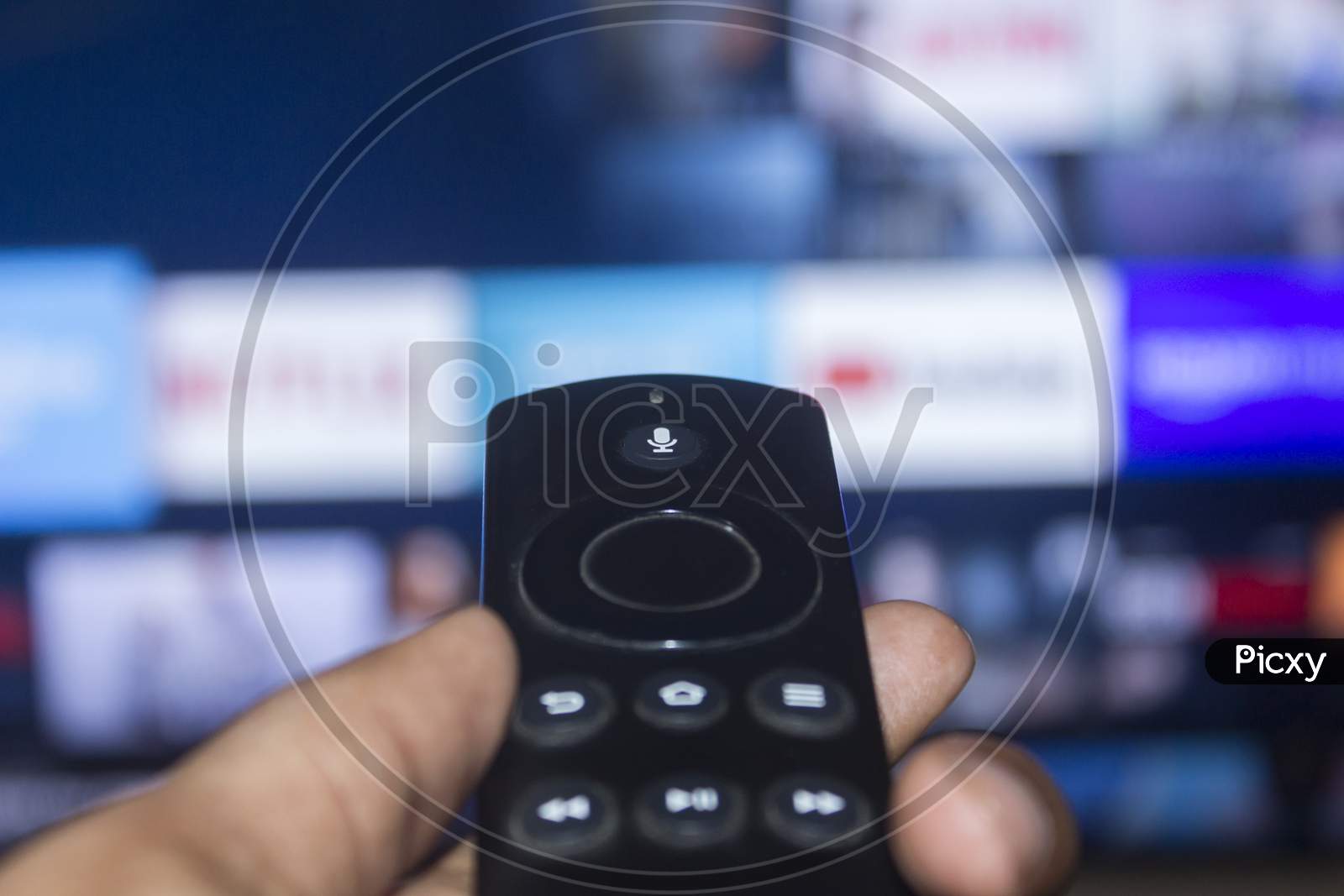 Voice assistant remote control of smart tv