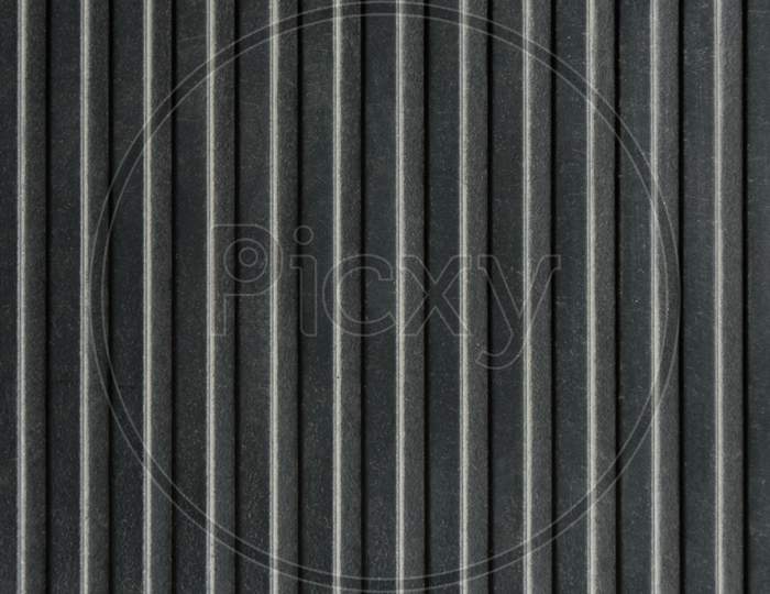Black Surface Material Texture Background. Material Surface And Close Up Texture Background Concept. Industrial And Production Theme.