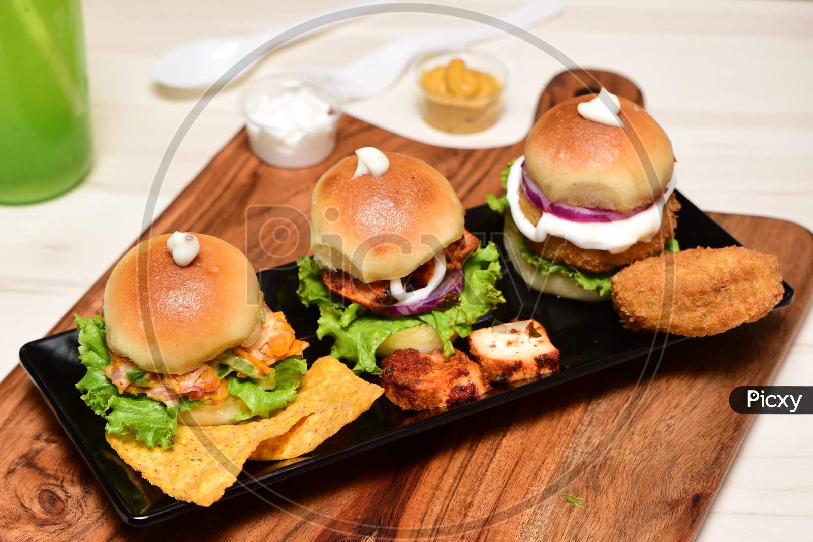 Burger served in Indian restaurant with paneer