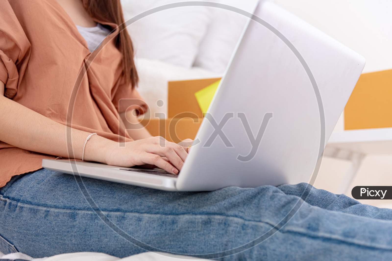 Closeup Of Laptop Using By Woman For Online Shopping Delivery Business At Home. Girl Typing On Keyboard By Hand. People Lifestyle And Occupation Concept. Entrepreneur Work From Home And Shop Owner