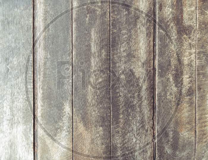 Closeup Of Old Brown Wooden Plank Texture Background. Wallpaper Backdrop. Abstract Wood Floor And Wall Structure. Top View Angle. Vertical Pattern