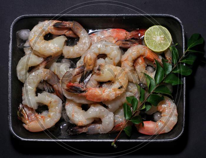 fresh raw prawns in container