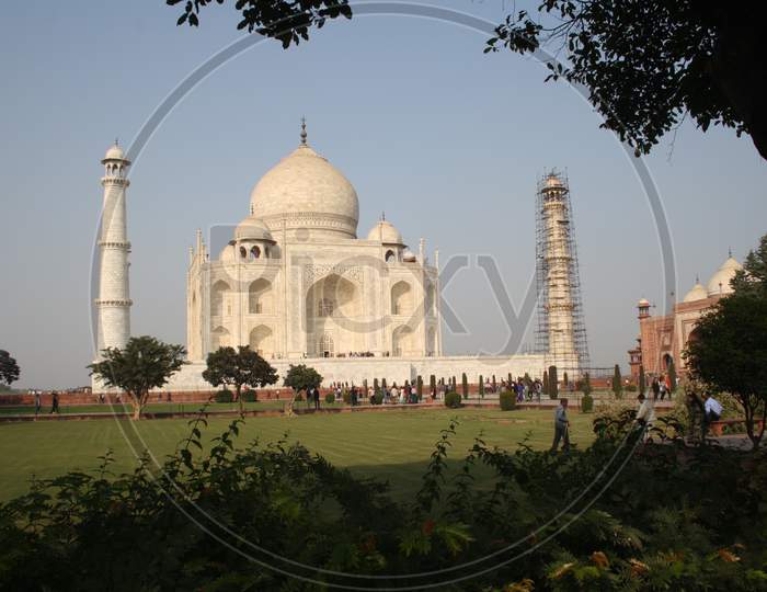a view of the famous Taj Mahal, a white marble mausoleum