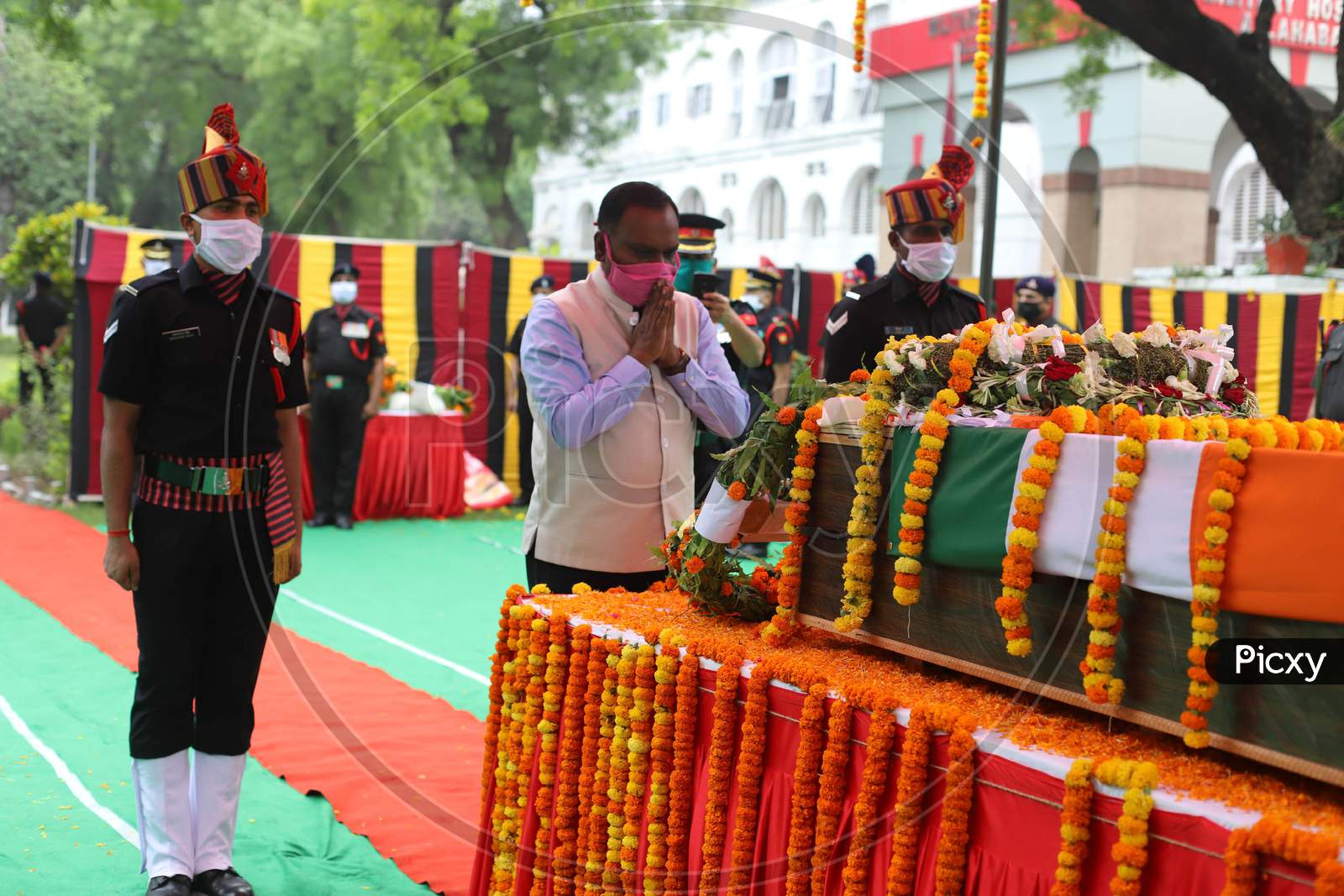 An Officer Salutes At The Coffin Of N K Deepak Singh, An Indian Soldier Who Was Killed In A Border Clash With Chinese Troops In Ladakh Region, During His Funeral Ceremony At Military Hospital In Prayagraj, June 19, 2020.