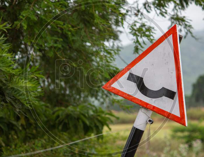 Indian Road Sign Indicating Dip Ahead, Hasanur, Tamil Nadu, India