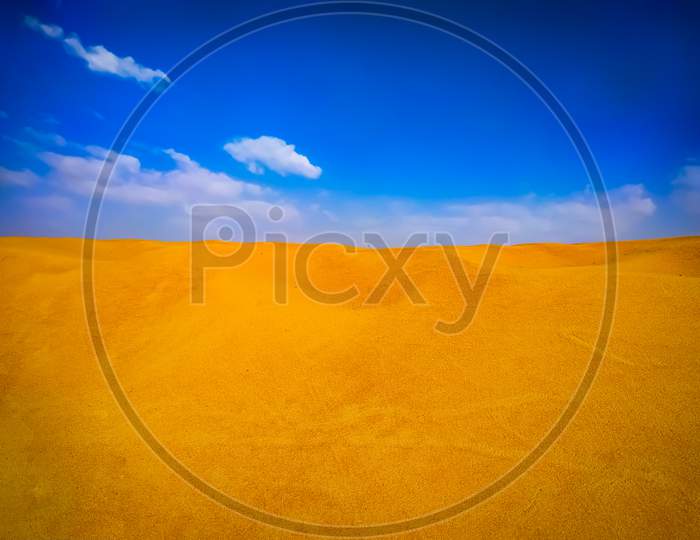 Sand dunes and blue sky