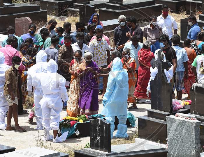 Health Workers And Relatives Carry The Body Of The Covid19 Victim To Be Buried In A Christian Cemetery In Chennai
