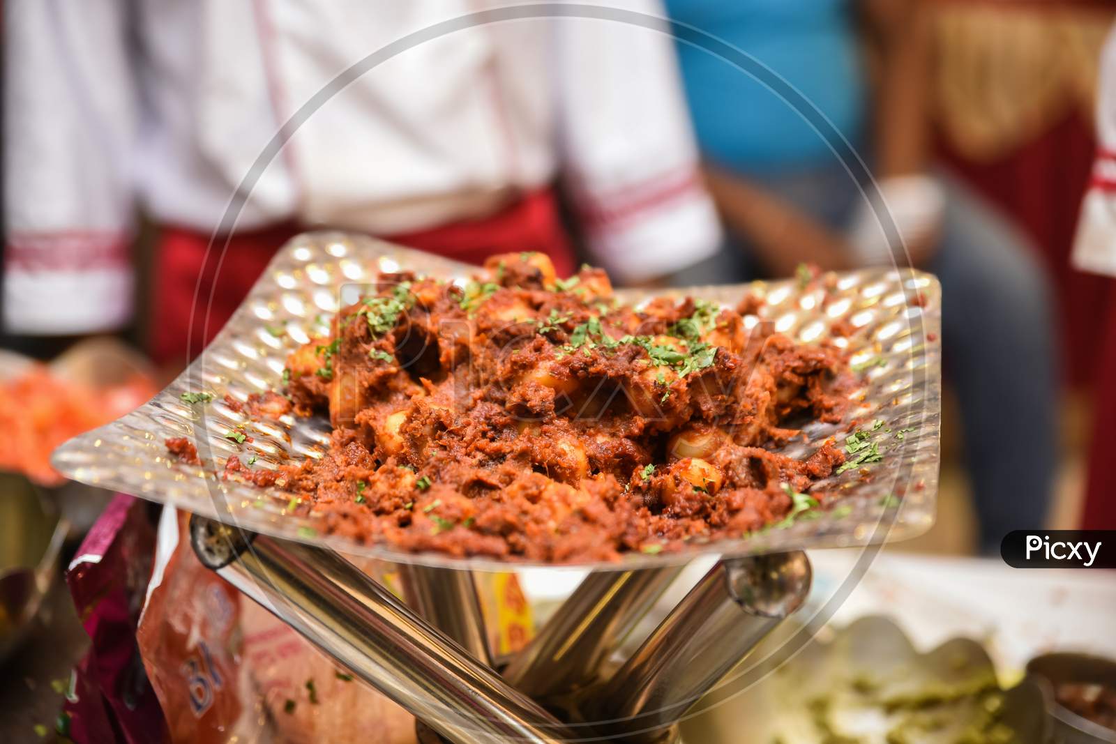 Spicy alu dum served in Indian wedding event in India