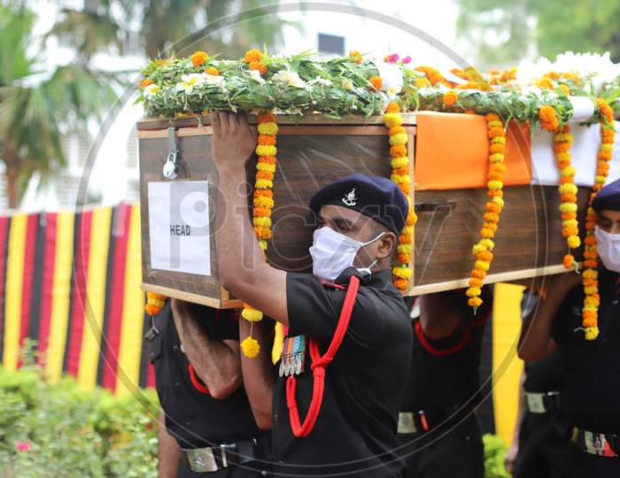 Indian Army Jawans carry the Mortal Remains of N K Deepak Singh, An Indian Soldier Who Was Killed In A Border Clash With Chinese Troops In Ladakh Region, during the funeral ceremony at Military Hospital In Prayagraj, June 19,2020.
