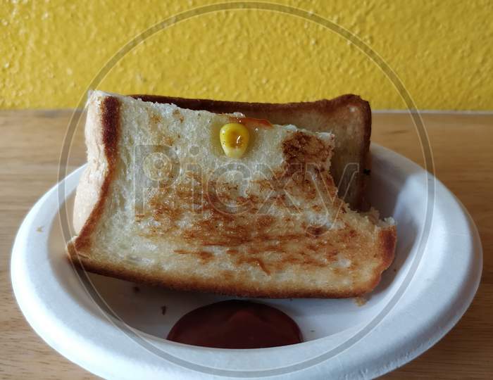 cheese veg corn sandwich with ketchup