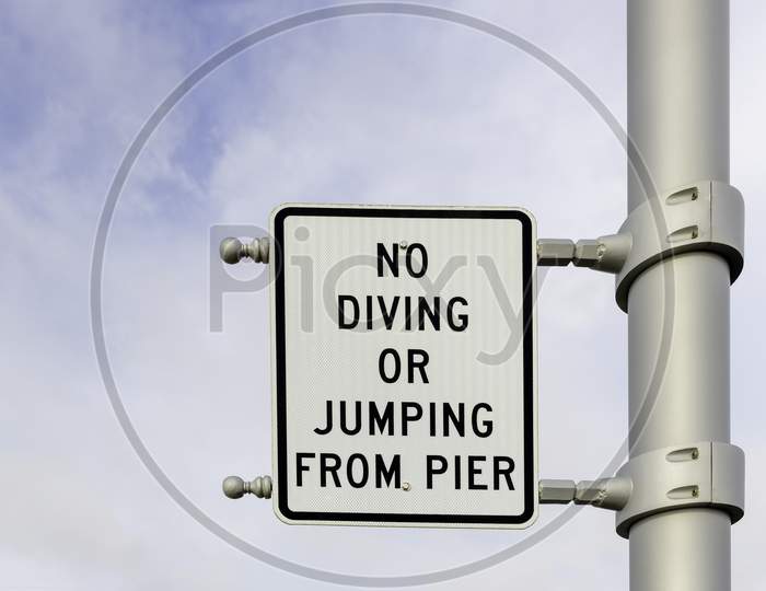 No Diving Or Jumping From Pier Sign