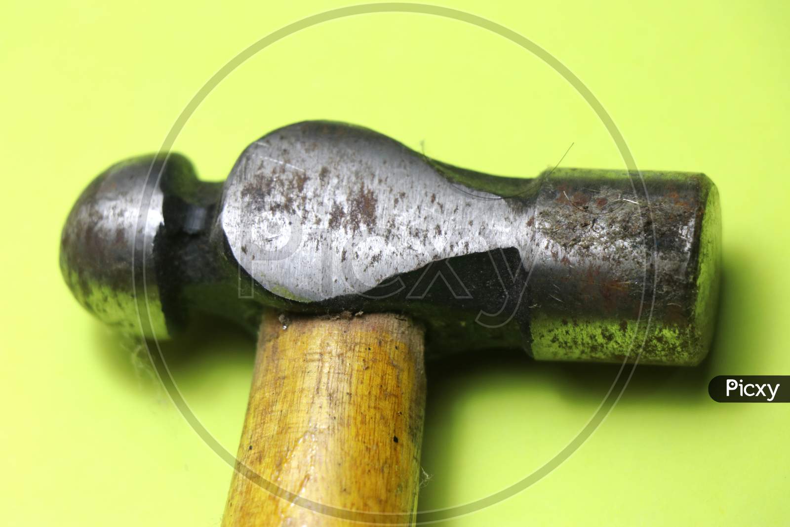 Close Up Of Ball Peen Hammer With Wooden Handle