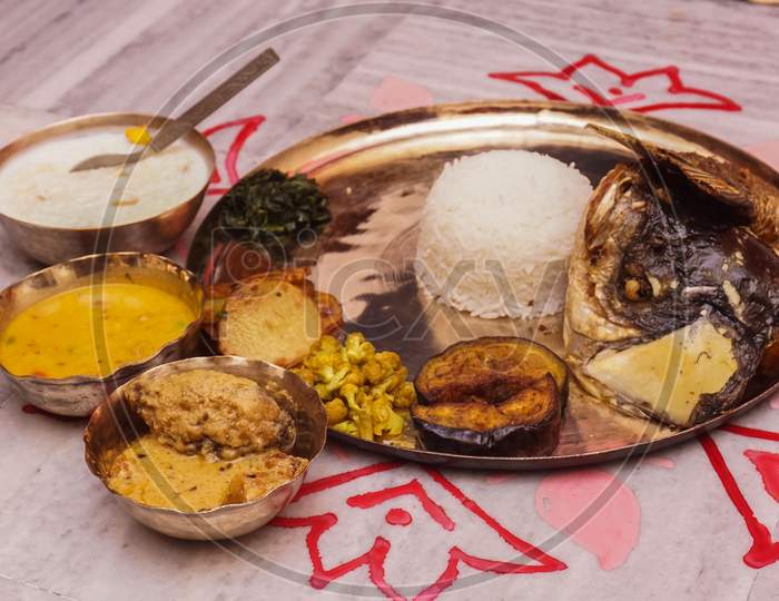 illustration of Traditional Bengali cuisine served in rice ceremony of West Bengal India