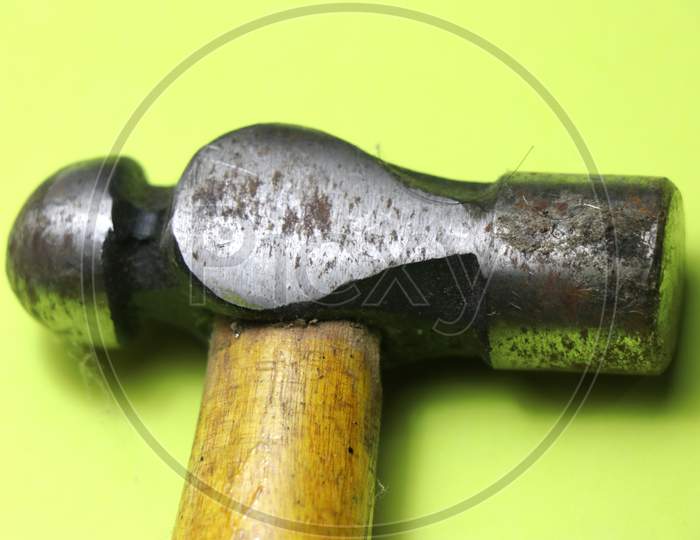 Close Up Of Ball Peen Hammer With Wooden Handle