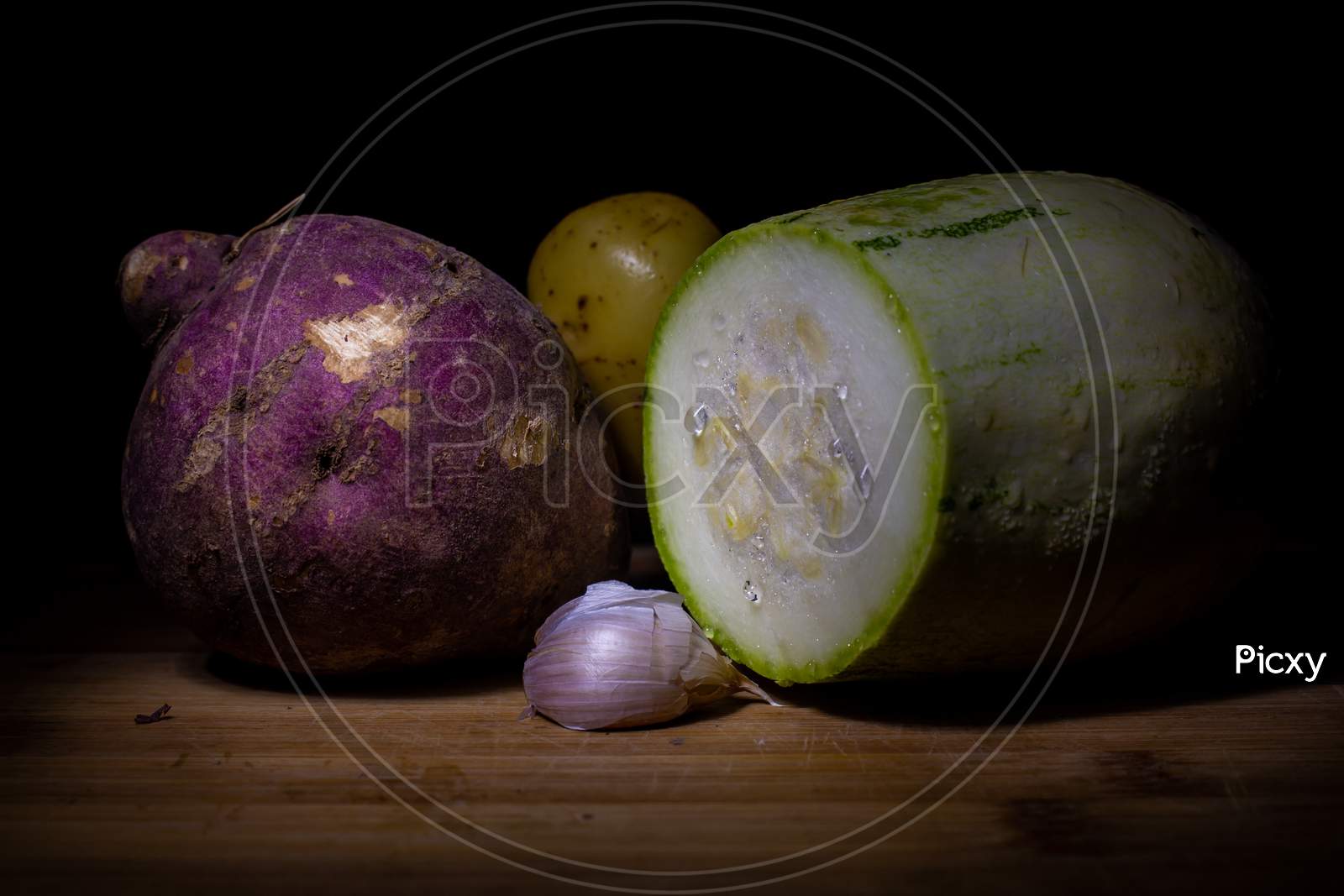 Set Of Fresh Vegetables On A Wooden Board. Black Background With Free Space To Write.
