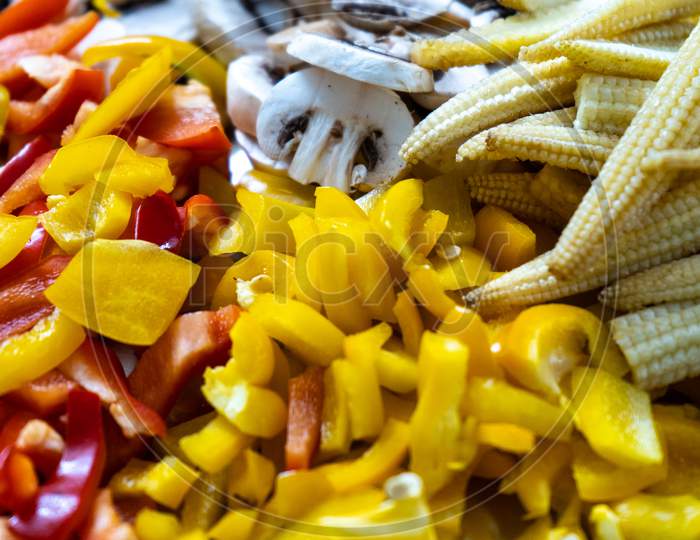 Mix Of Multicolored Vegetables With Mushrooms, Baby Corn, Yellow Chilli Peppers And More Cur For A Vegetarian Dish