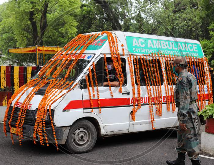 An Ambulance Carries The Mortal remains of N K Deepak Singh, An Indian Soldier Who Was Killed In A Border Clash With Chinese Troops In Ladakh Region, During His Funeral Ceremony At Military Hospital In Prayagraj, June 19, 2020