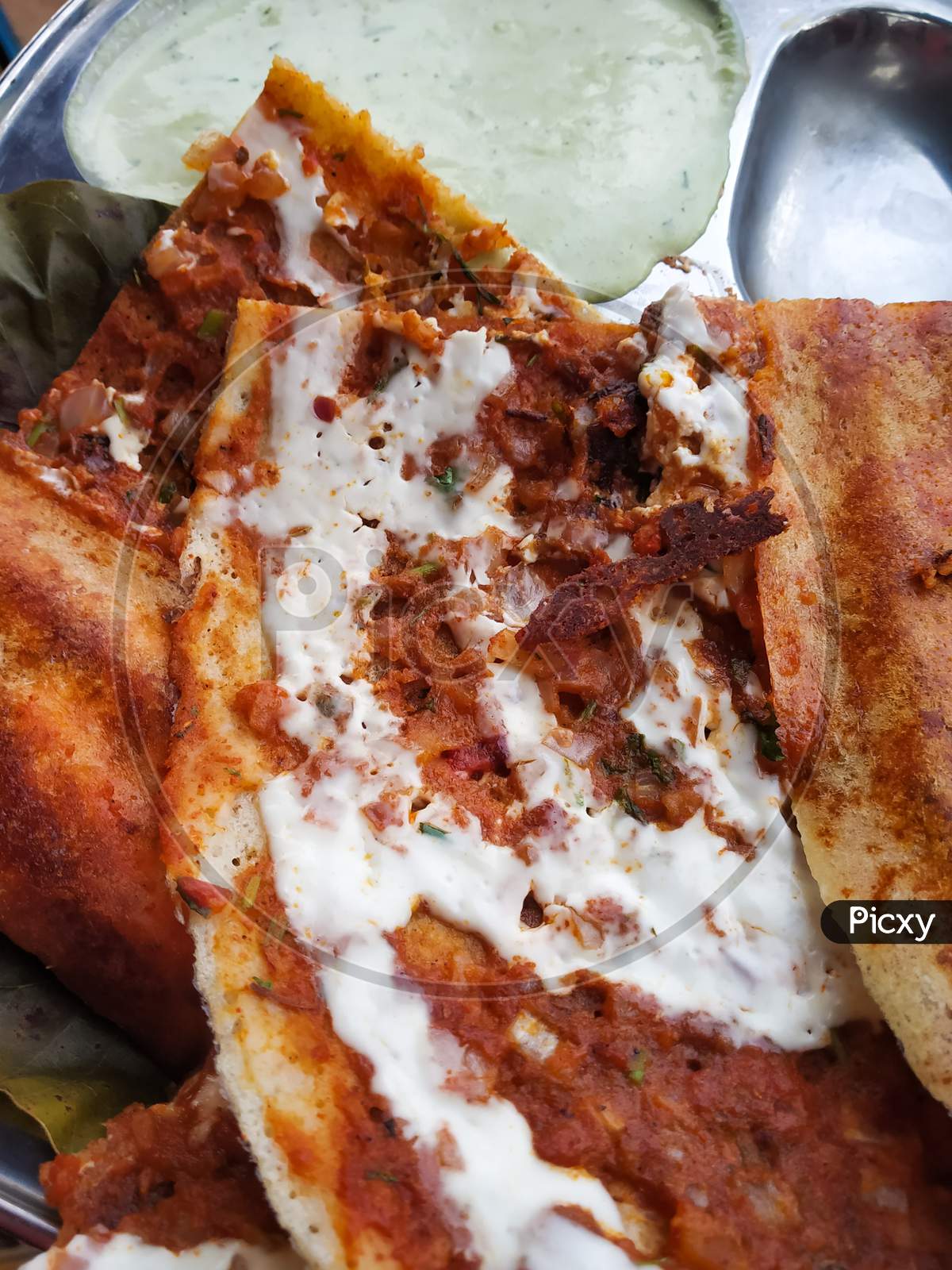 Close up of a cheese dosa