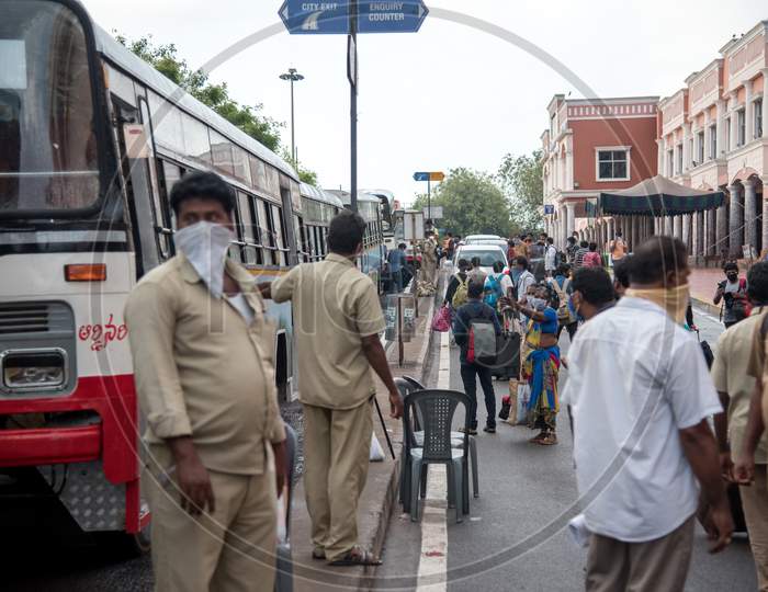 people boarding buses from Visakhapatnam railway station to Vijayanagaram and Srikakulam