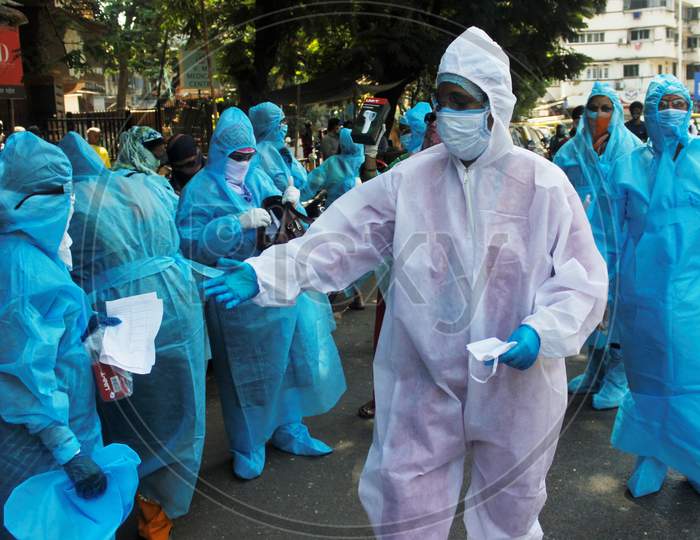 Healthcare workers on their daily rounds to slum areas to check the residents during a nationwide lockdown to slow the spreading of the coronavirus disease (COVID-19), in Mumbai, India on April 20, 2020.