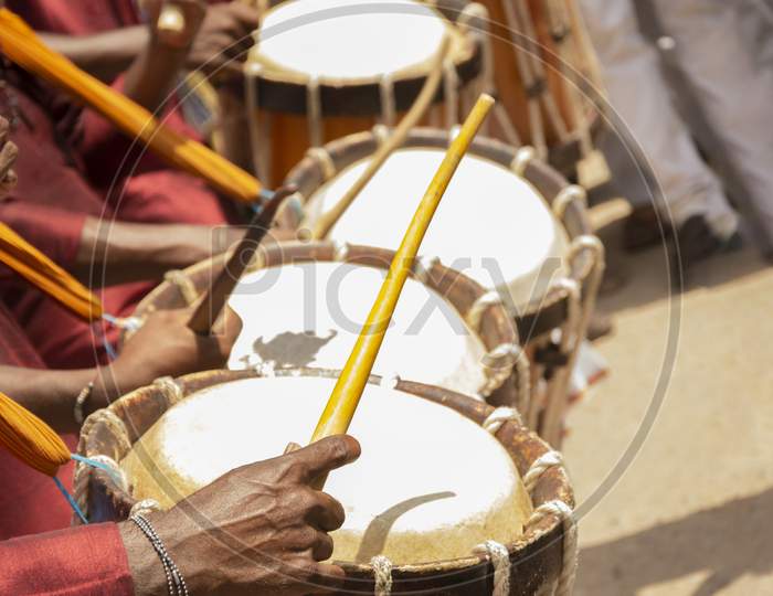 Close Up Of Group Of People Hands Performing Indian Art Form Chenda Or Chande A Cylindrical Percussion Playing During Festival.
