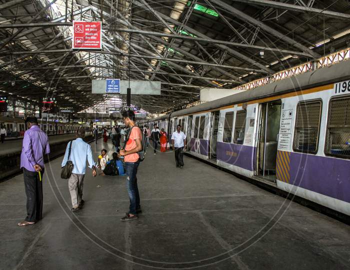 Mumbai, Maharashtra / India - June 2 2020: A Scene Of Mumbai Local At Cst Station Where People Stand In A Queue Maintains Social Distancing From Each Other During Lock Down Due To Corona Virus.