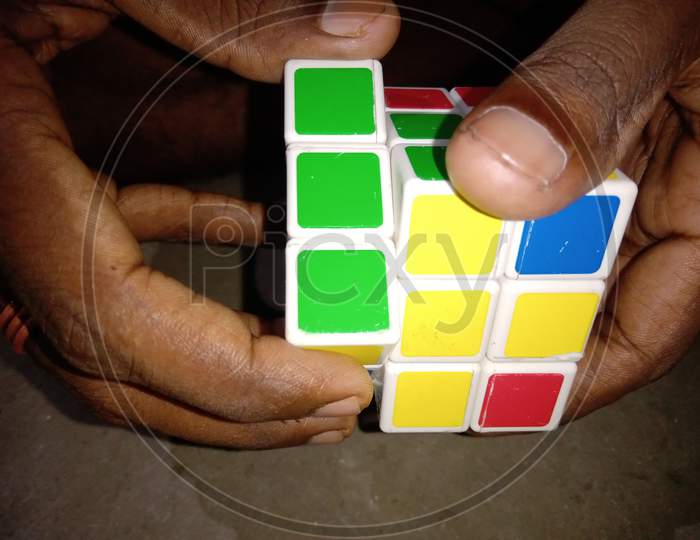 Man are trying to solve cube rudiks India