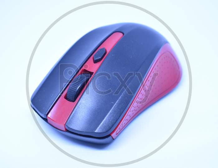 Black And Red Wireless Computer Mouse On White Background