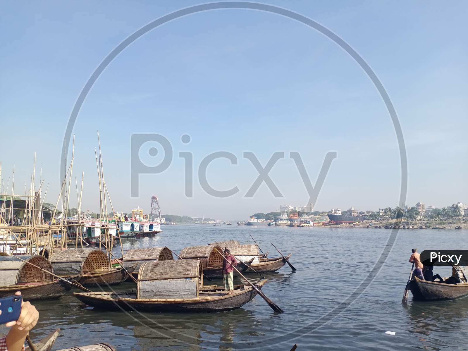 Standing Boat At Shitalakshya River.Small Rowboats Are Waiting For Passengers On The Shitalakshya River.
