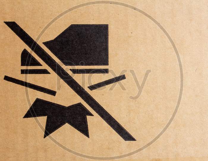 Packaging Symbol To Indicate Do Not Step Over The Box To Prevent From Damage.