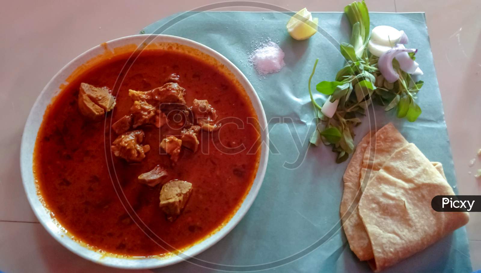 Mutton & roti Maharashtrian thali with salads