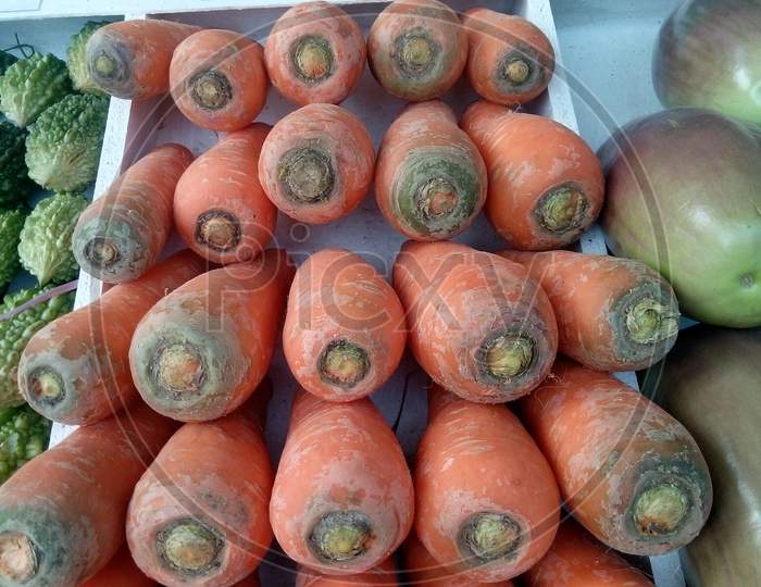 Carrots.he carrot is a root vegetable,usually orange in color.