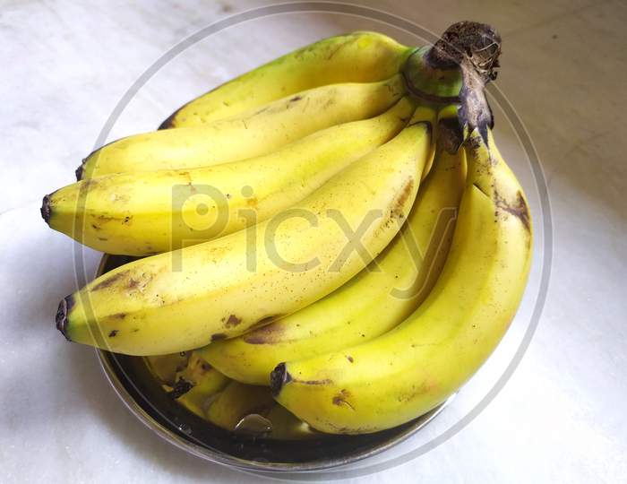 Banana on steel plate.