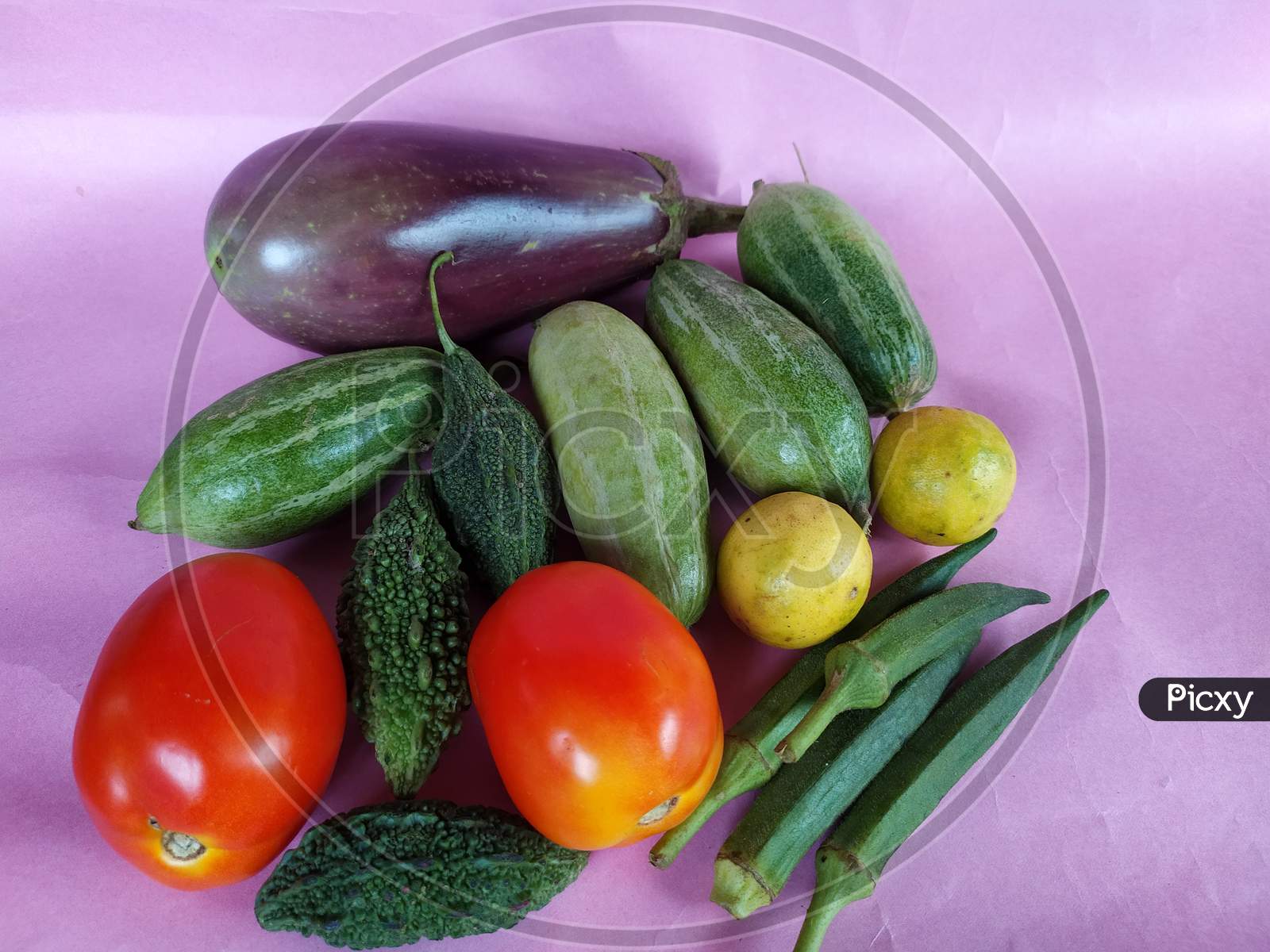 Vegetables on colour background.