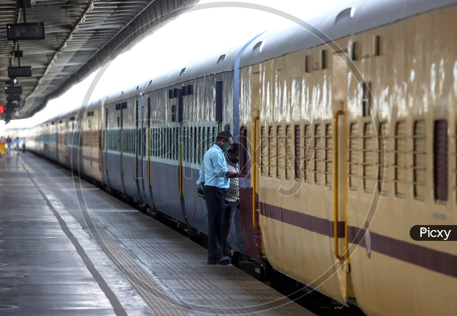 Workers Prepare A Train Carriage As A Temporary Covid-19 Isolation Facility At Anand Vihar Railway Station, In New Delhi On June 17, 2020.