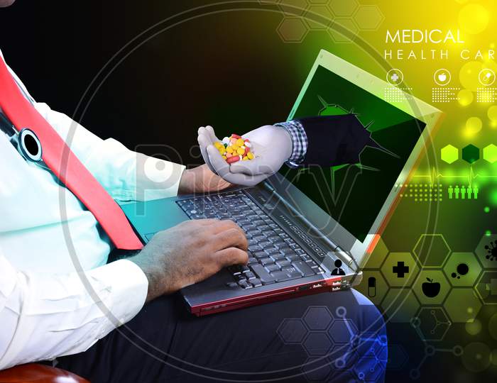 Doctor With Stethoscope And Laptop