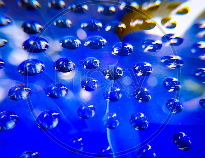 Water drops on blue